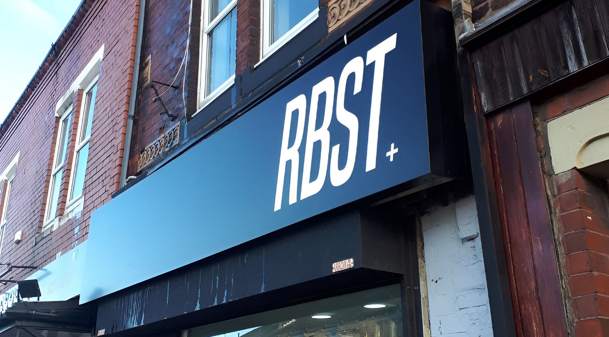 RBST+ Barber Shop exterior sign in Horwich, England, GB.