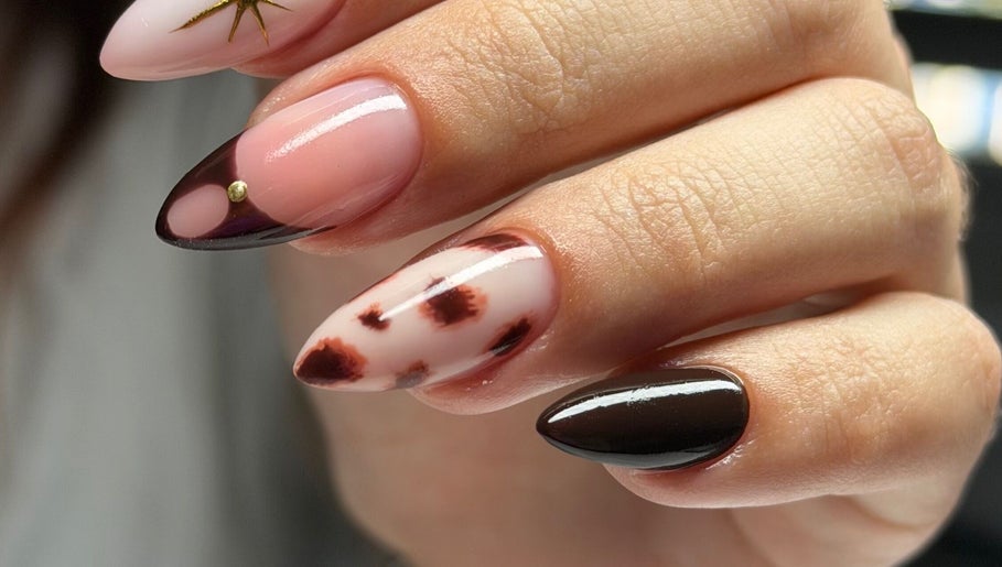 Stunning nail art at Burjuwanails, Lyndhurst, New Jersey, US showcasing intricate designs and elegance.