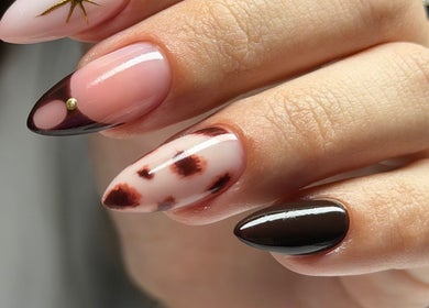Stunning nail art at Burjuwanails, Lyndhurst, New Jersey, US showcasing intricate designs and elegance.