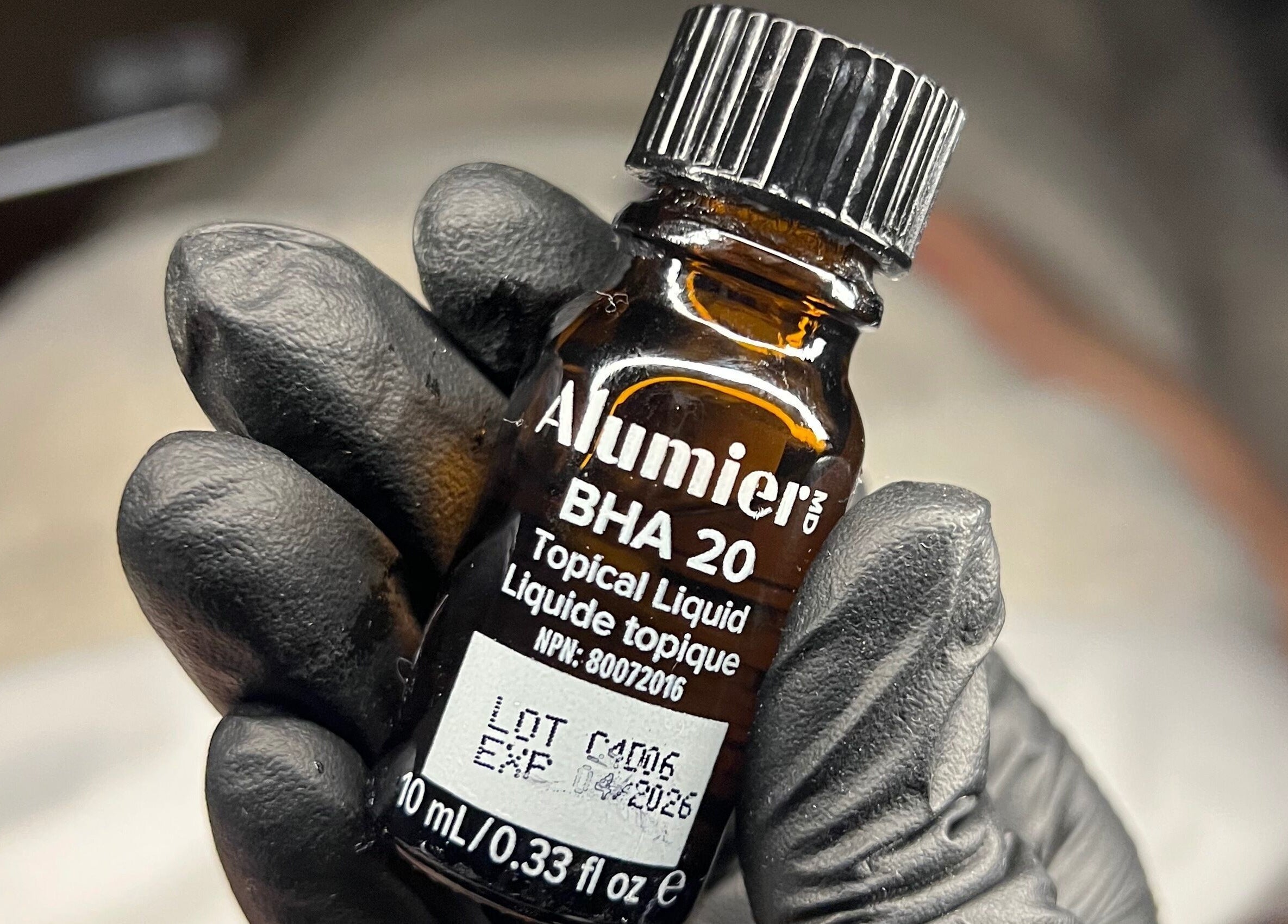 AlumierMD BHA 20 serum held at Illuminate Aesthetics Lounge, Toronto, Ontario, CA.