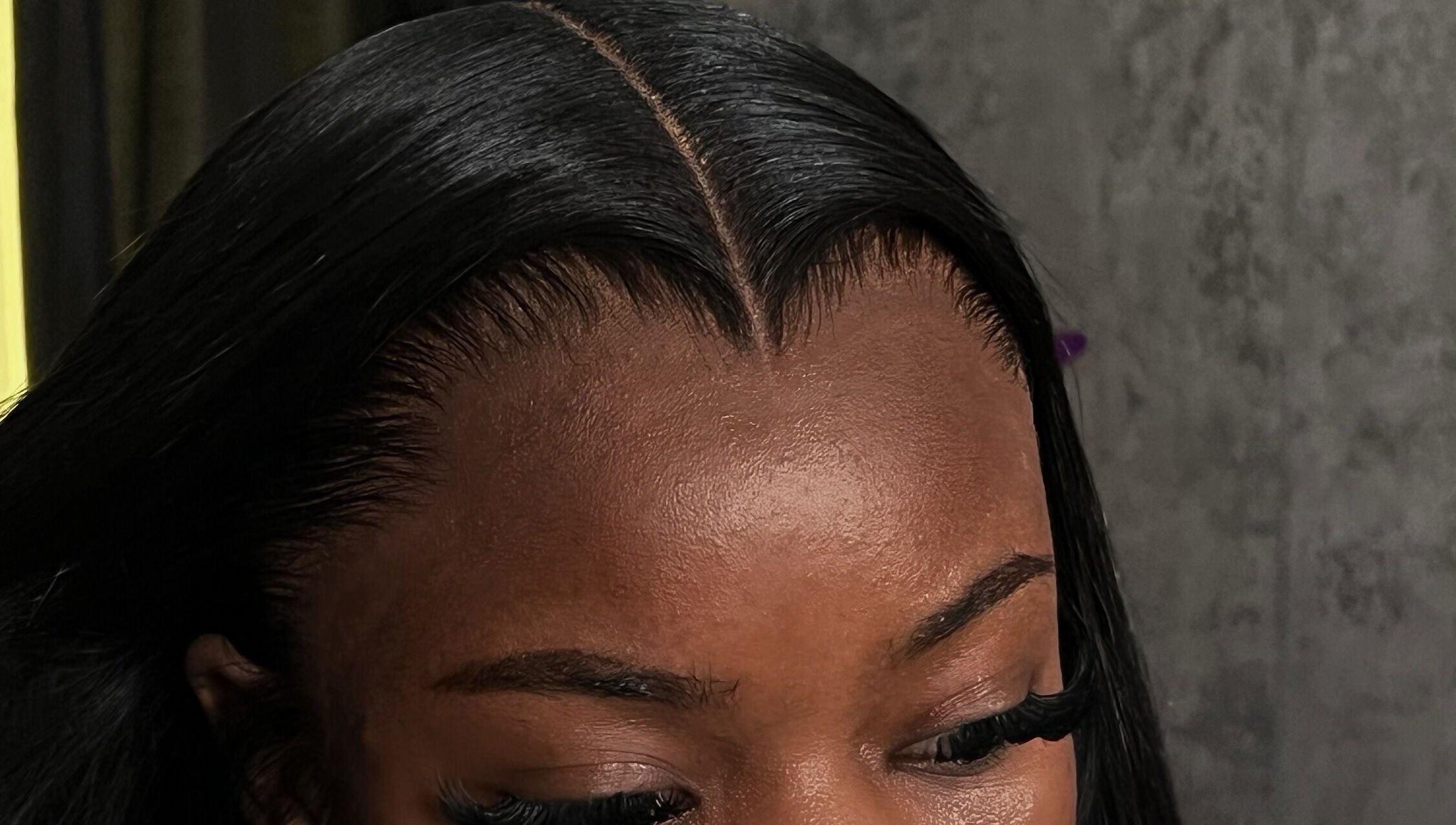 Close-up of a sleek hairstyling at Misfits HQ, Vaughan, Ontario, CA, showcasing expert hairline design.