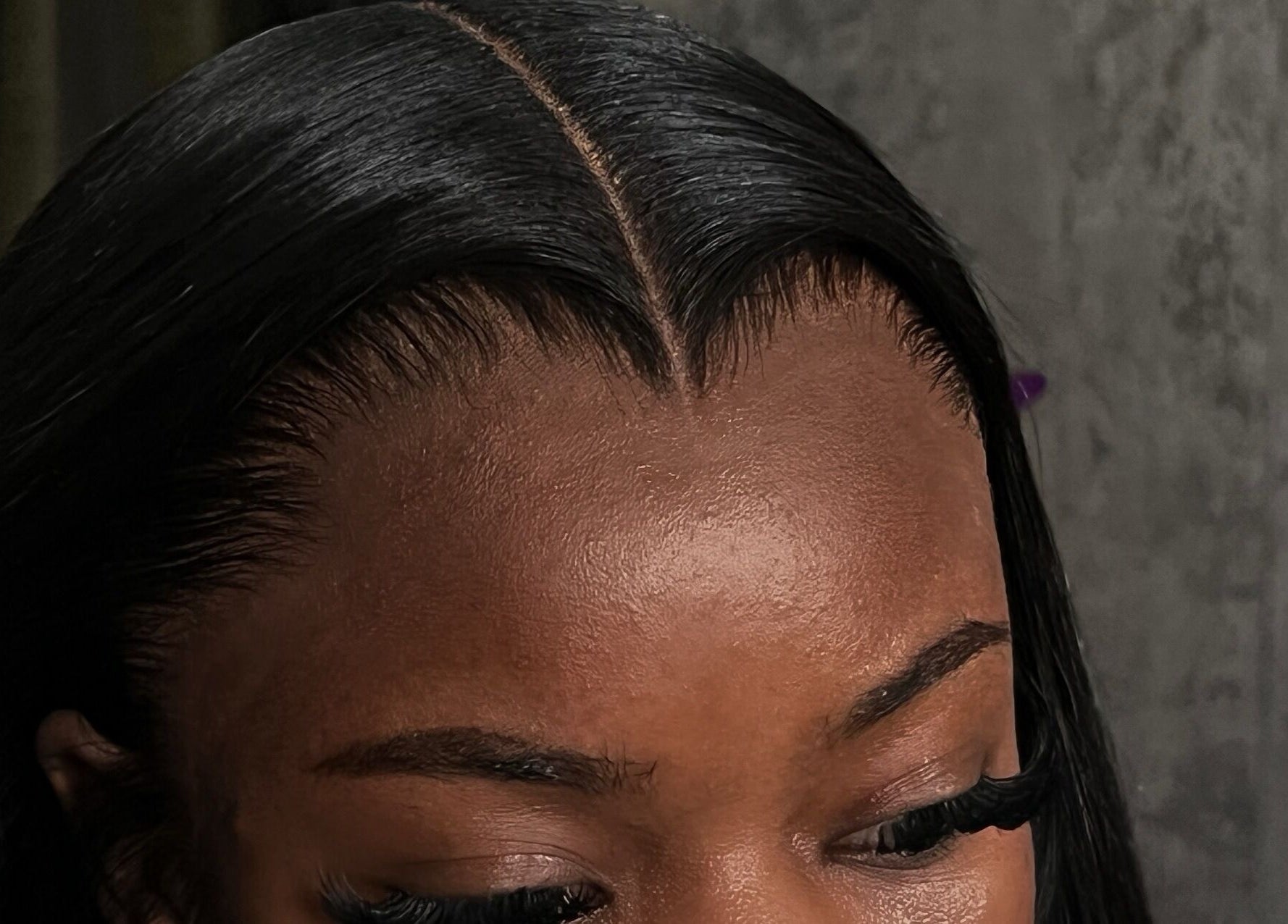 Close-up of a sleek hairstyling at Misfits HQ, Vaughan, Ontario, CA, showcasing expert hairline design.