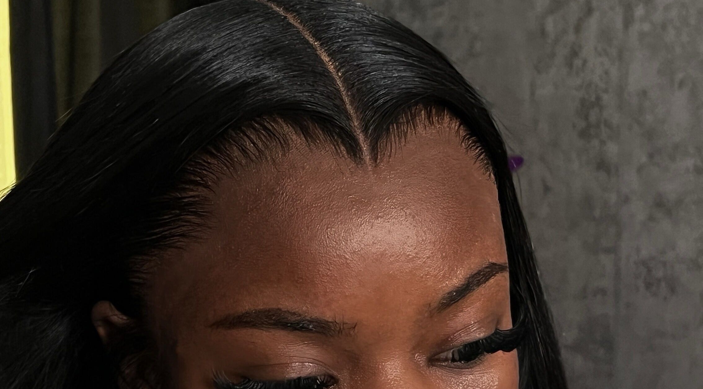 Close-up of a sleek hairstyling at Misfits HQ, Vaughan, Ontario, CA, showcasing expert hairline design.