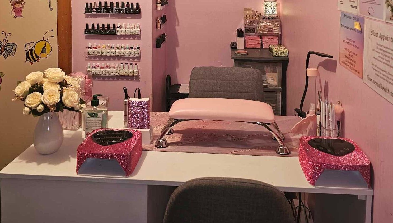 Chic nail setup at Glam Nails by Immie in Invercargill, Southland, NZ with pink accents and floral decor.