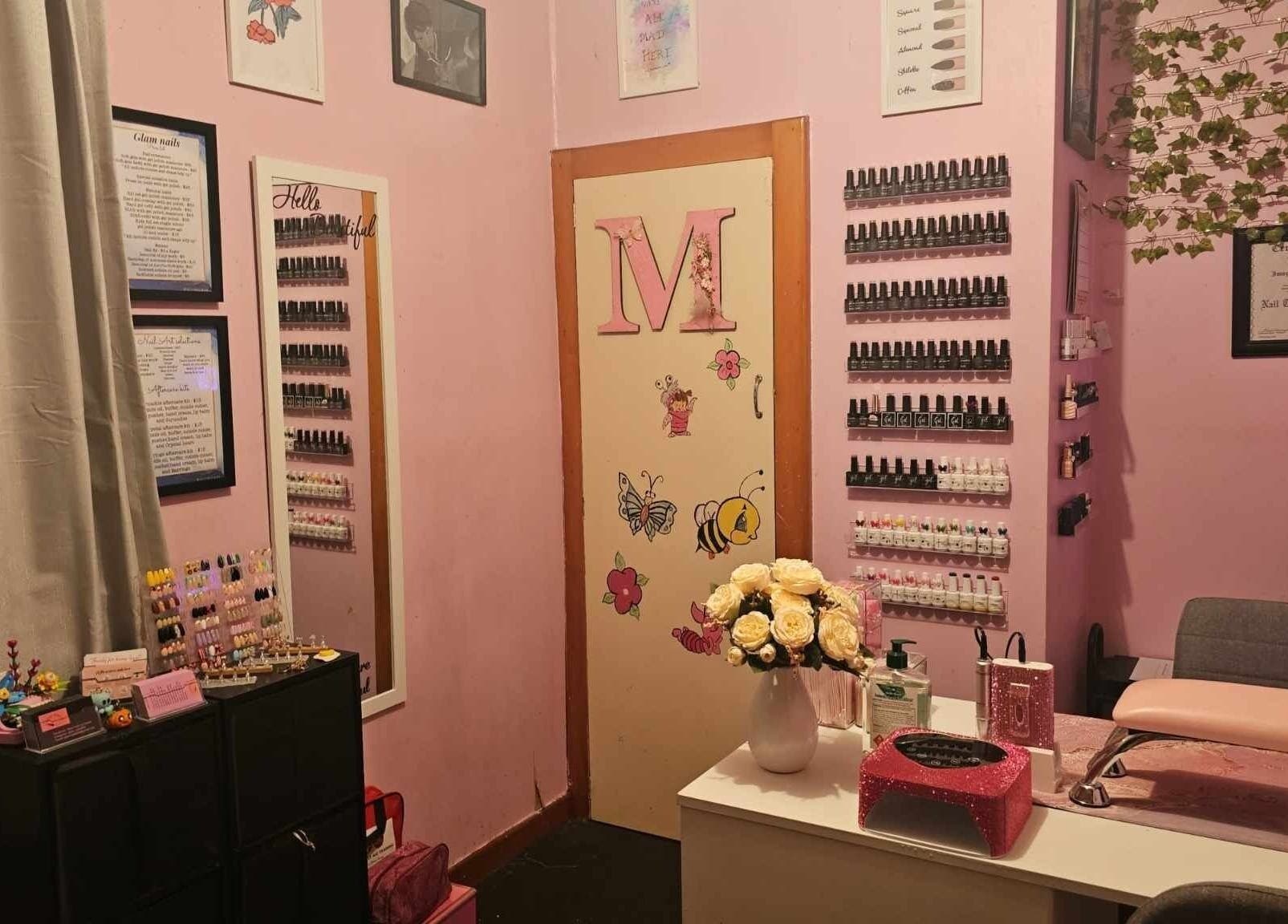Elegant interior of Glam Nails by Immie in Invercargill, Southland, NZ with vibrant decor and polish display.