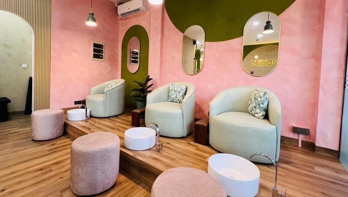 Elegant pedicure chairs at Raquel's Wennappuwa in Wennappuwa, North Western Province, LK with chic decor.