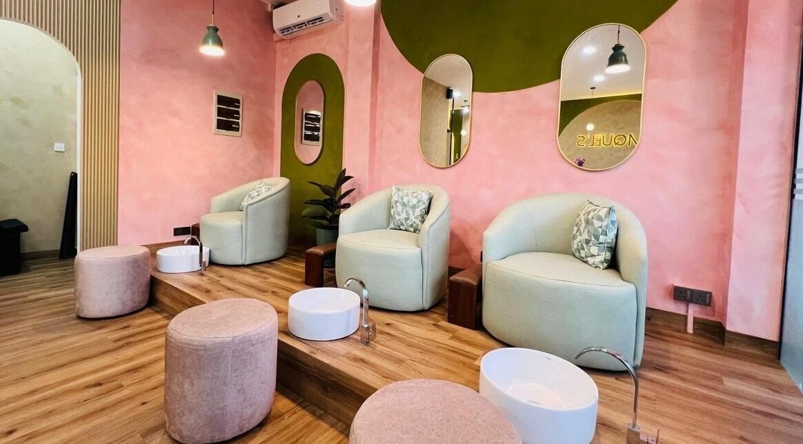 Elegant pedicure chairs at Raquel's Wennappuwa in Wennappuwa, North Western Province, LK with chic decor.