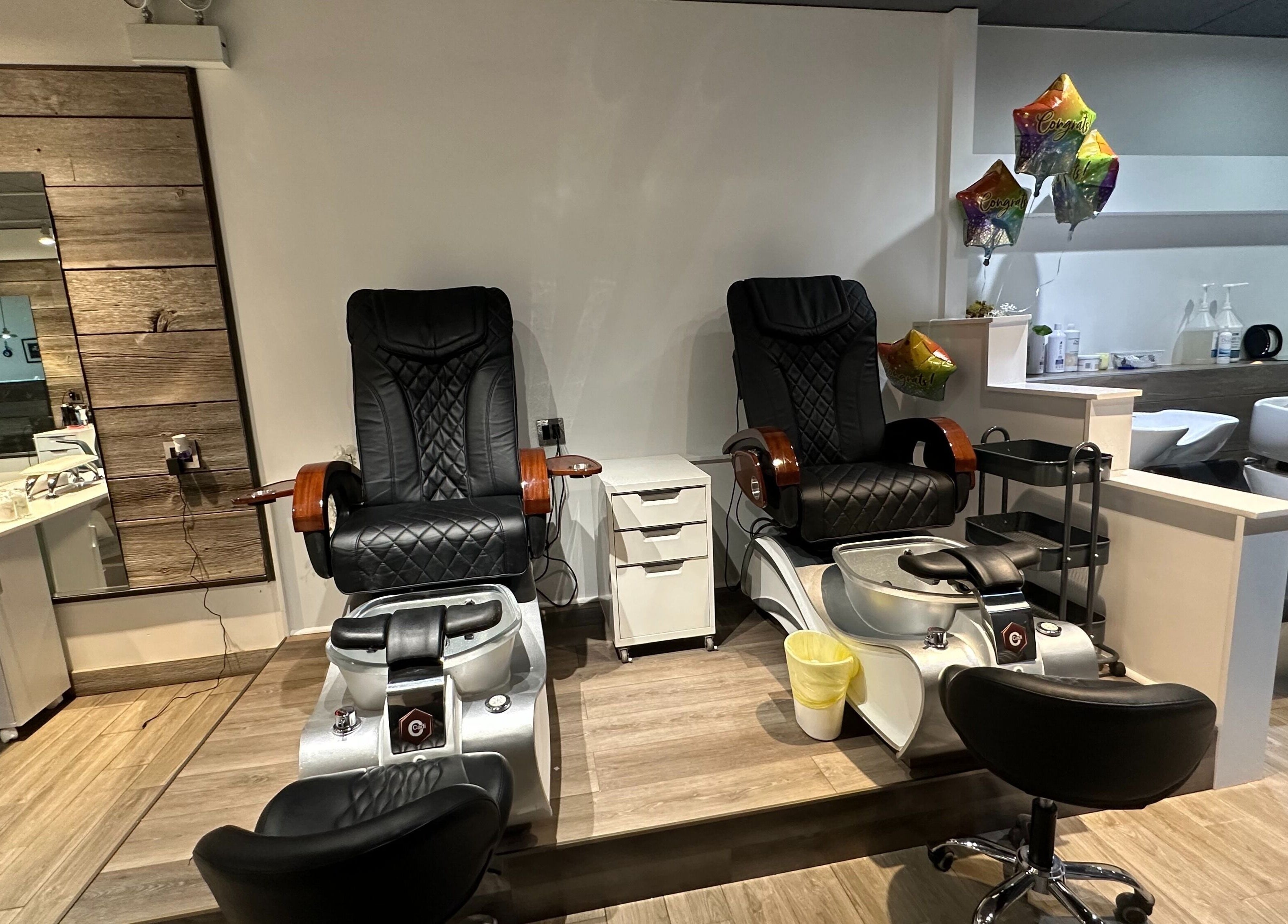 Elegant pedicure chairs at Eda Salon&Spa, Chicago, Illinois, US, offering relaxation and comfort.