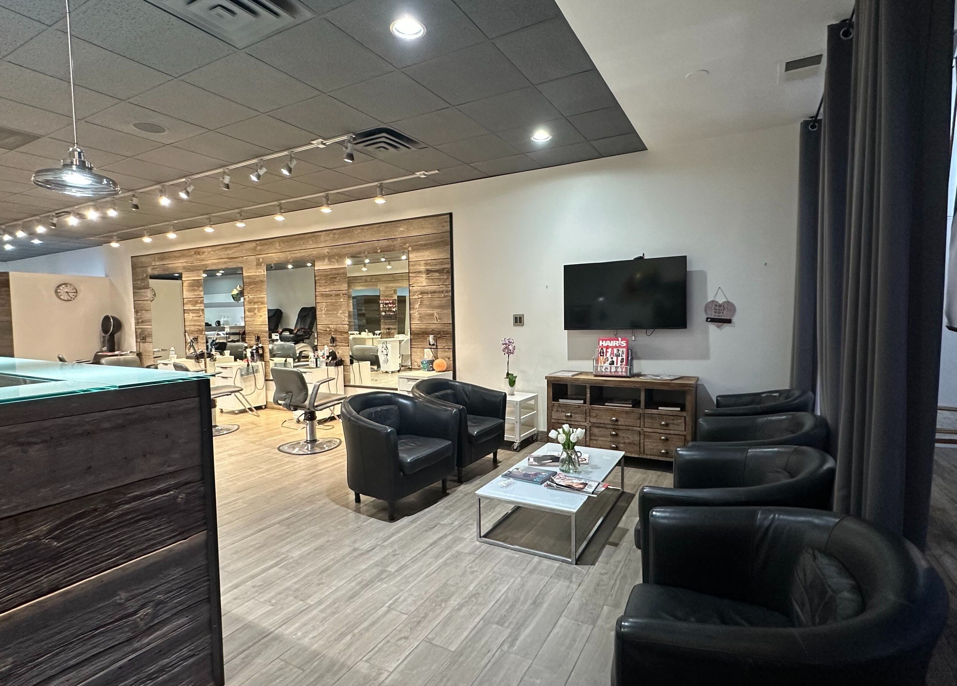 Modern interior of Eda Salon&Spa, Chicago, Illinois, US, featuring stylish chairs and elegant decor.