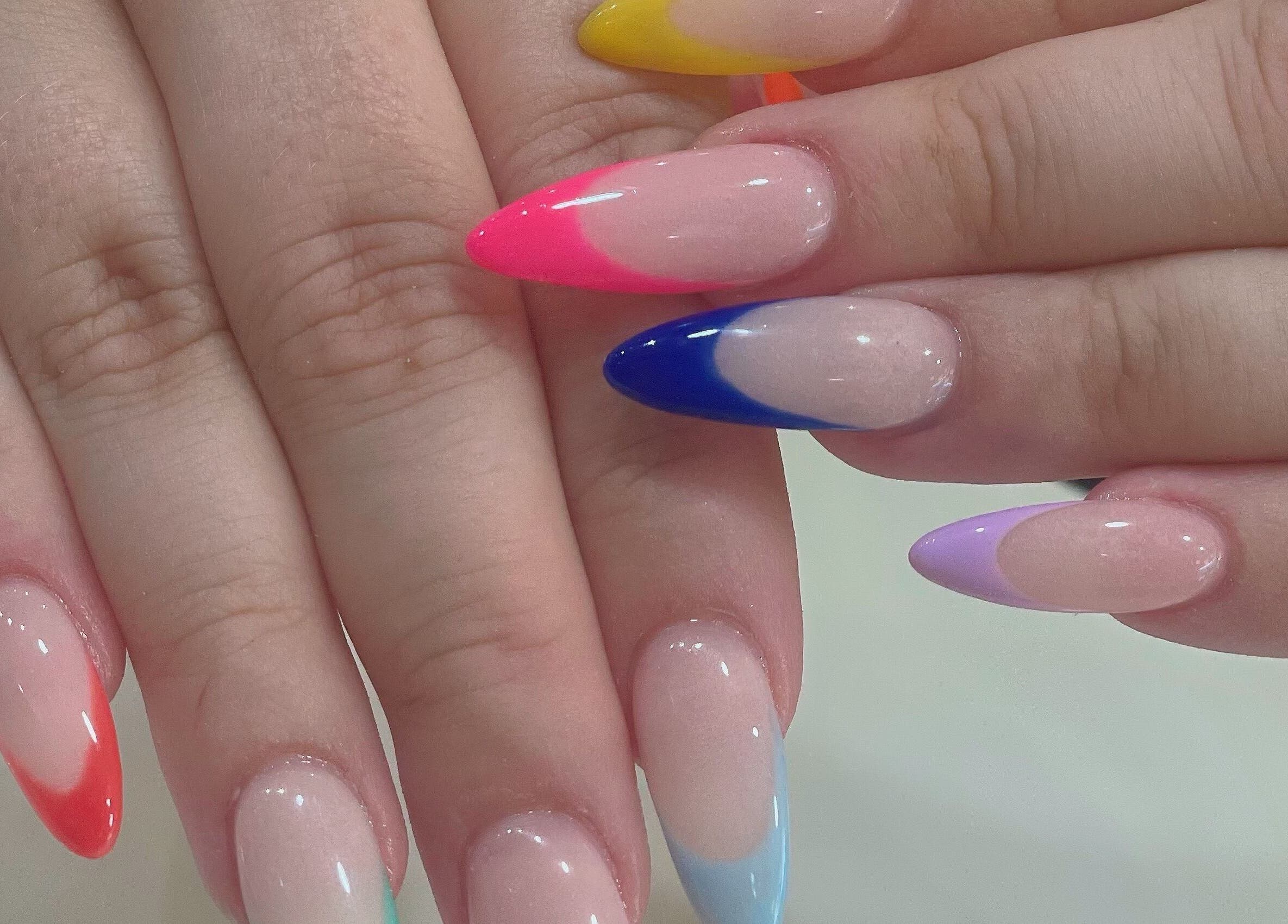 Colorful nail art at Jade Top Nails Hair Beauty Salon, Melbourne, Victoria, AU, showcasing vibrant, trendy designs.