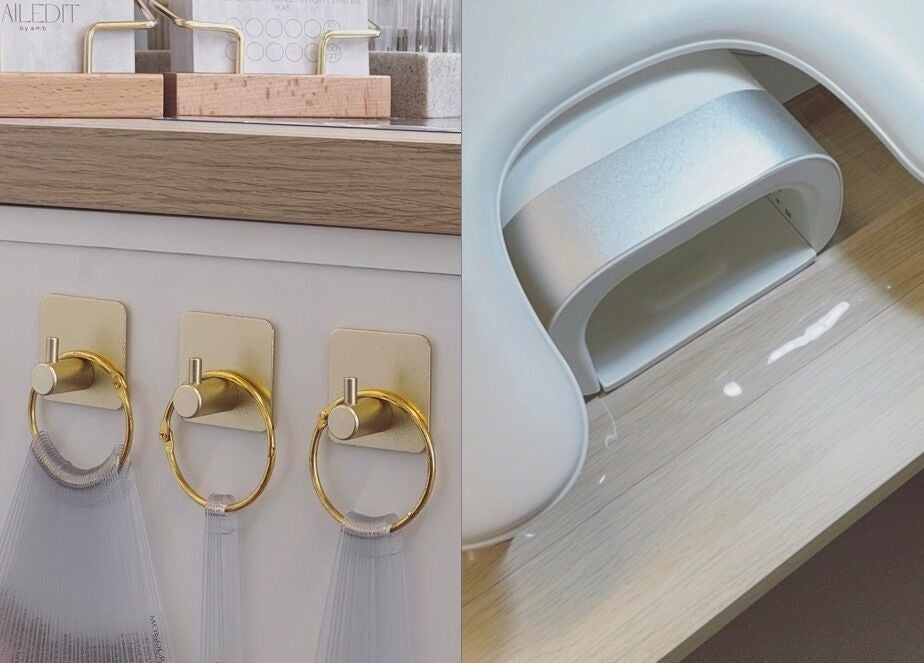 Stylish nail station at Ambnailedit, Cross Houses, England, GB, featuring gold hooks and modern nail equipment.