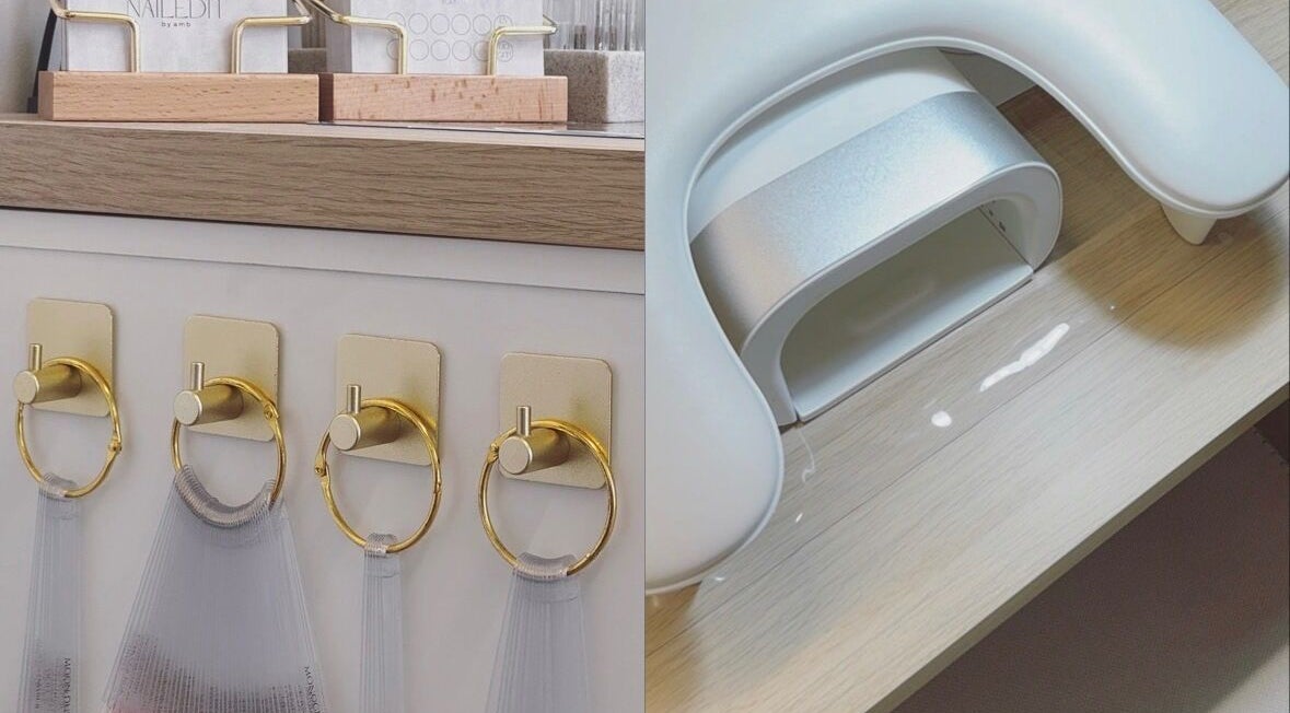 Stylish nail station at Ambnailedit, Cross Houses, England, GB, featuring gold hooks and modern nail equipment.