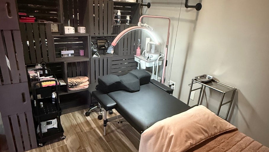 Treatment area with massage table at Shannan’s Beauty Bar, Tiverton, Rhode Island, US.
