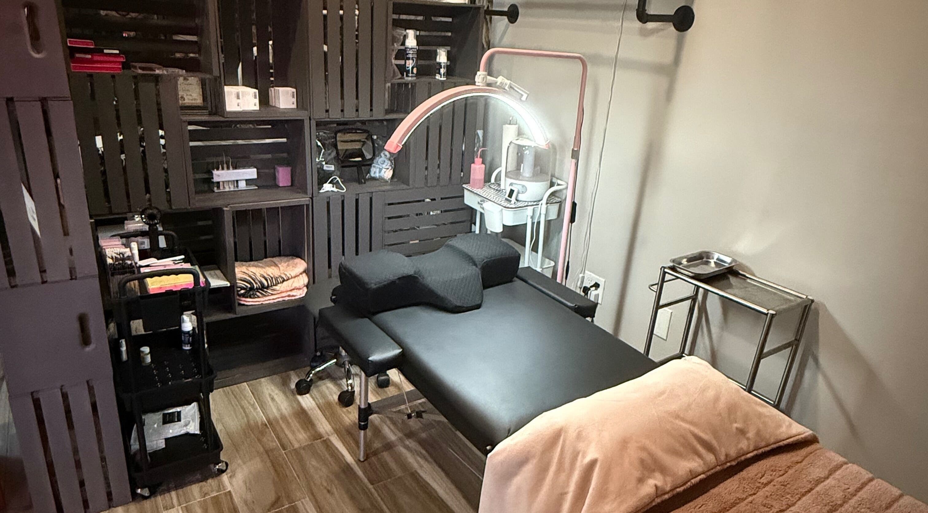 Treatment area with massage table at Shannan’s Beauty Bar, Tiverton, Rhode Island, US.