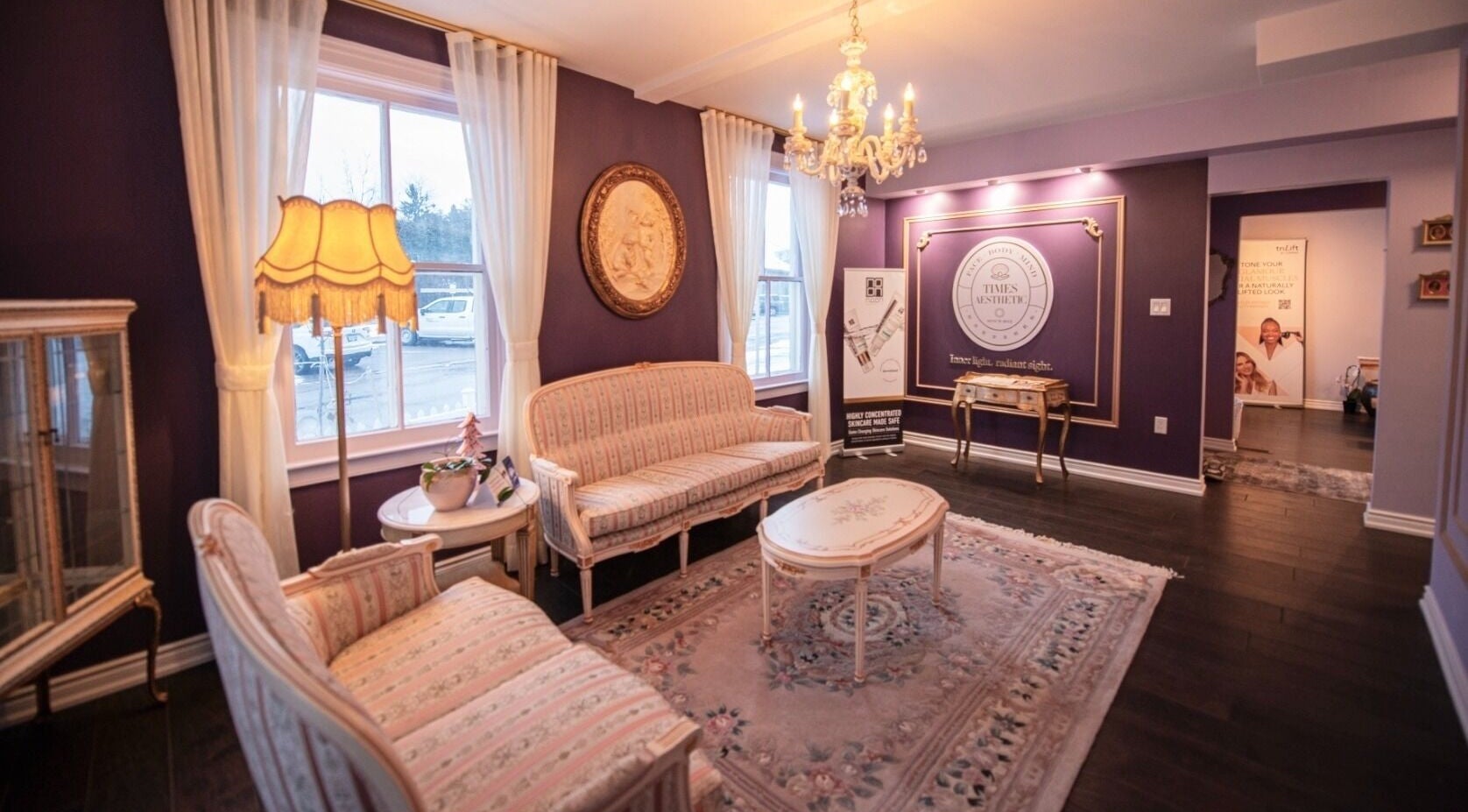 Chic waiting area at Times Aesthetic, Markham, Ontario, CA featuring plush seating and vintage decor.