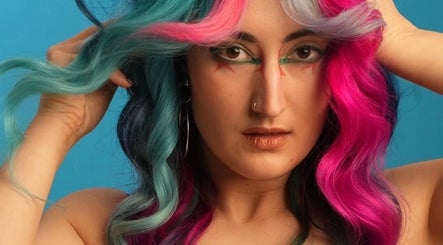 Model with colorful hair at Pinkflamingohairr in Newcastle, Tyne and Wear, GB, showcasing unique style.