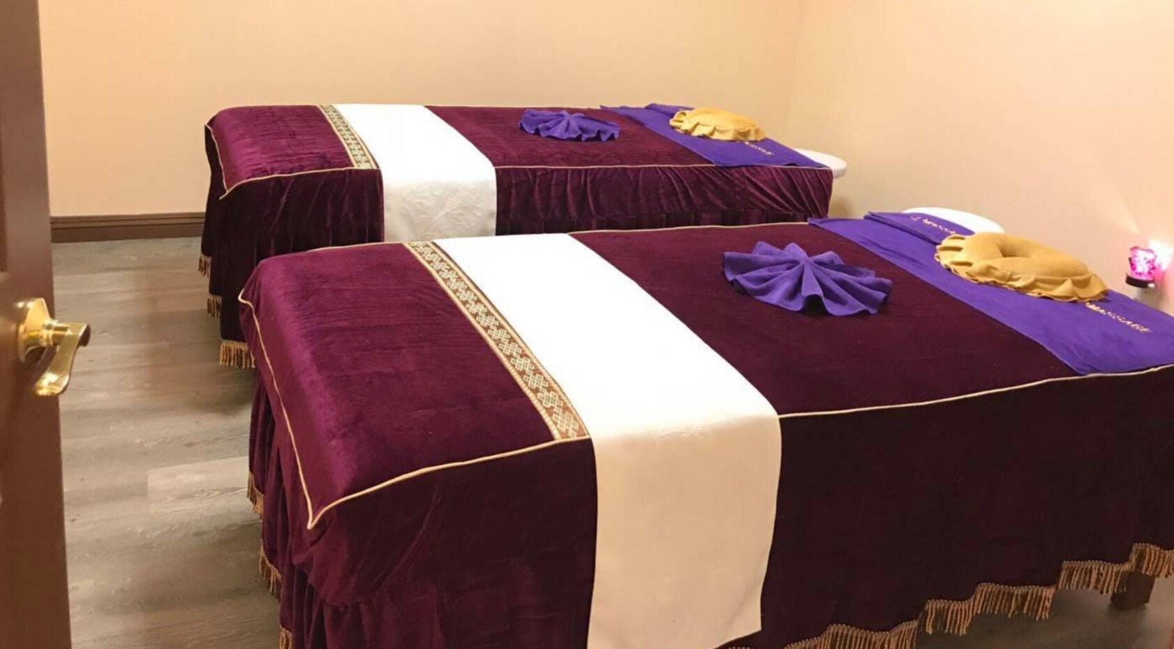 Tranquil massage room at Durango Massage, Las Vegas, Nevada, US, featuring two plush treatment tables.