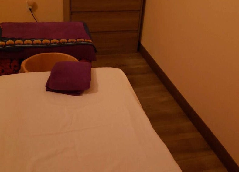 Cozy massage room at Durango Massage, Las Vegas, Nevada, US with soft lighting and inviting decor.