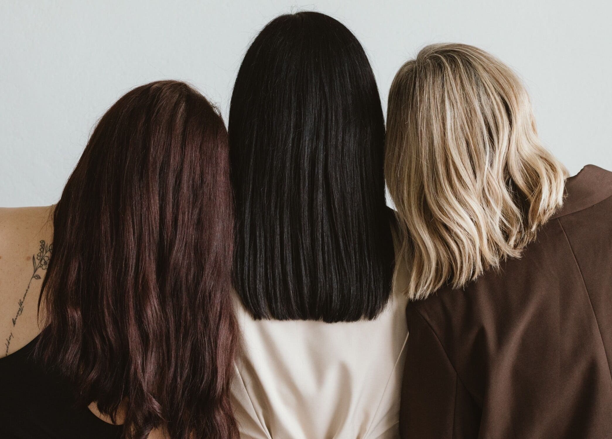 Three women showcase diverse hairstyles at Willow Hair Co in Gwandalan, NSW, AU.