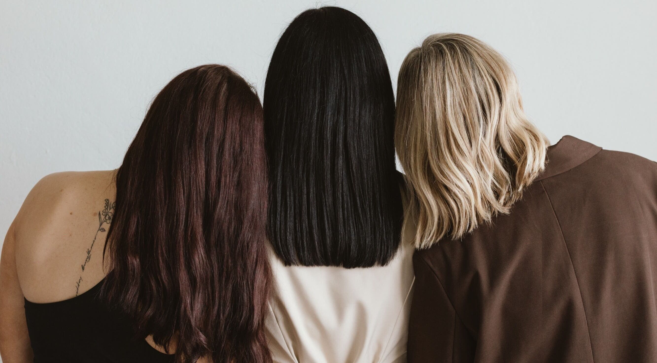 Three women showcase diverse hairstyles at Willow Hair Co in Gwandalan, NSW, AU.