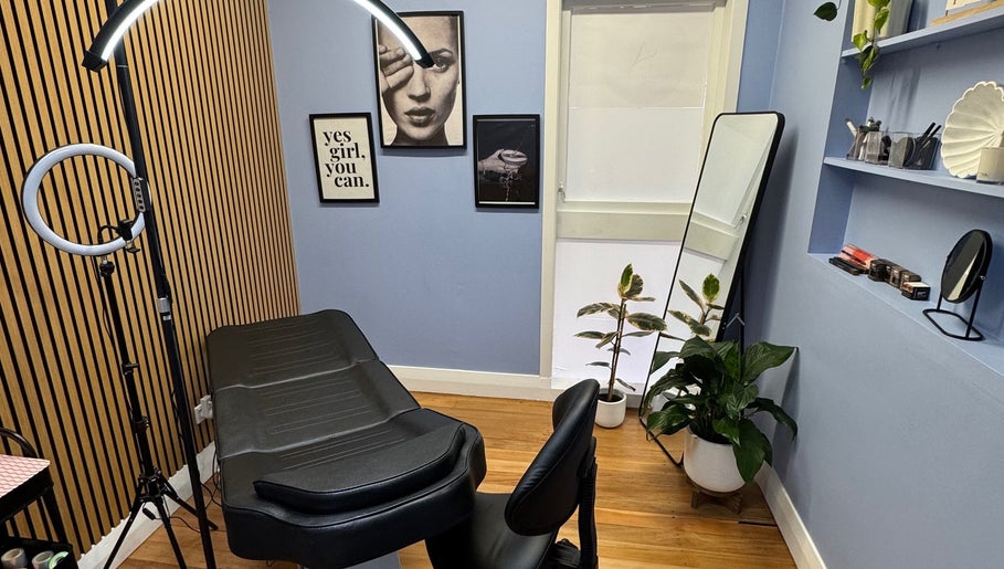 Elegant beauty treatment room with black chair at A.BrowsnLashes, Kerikeri, Northland, NZ.