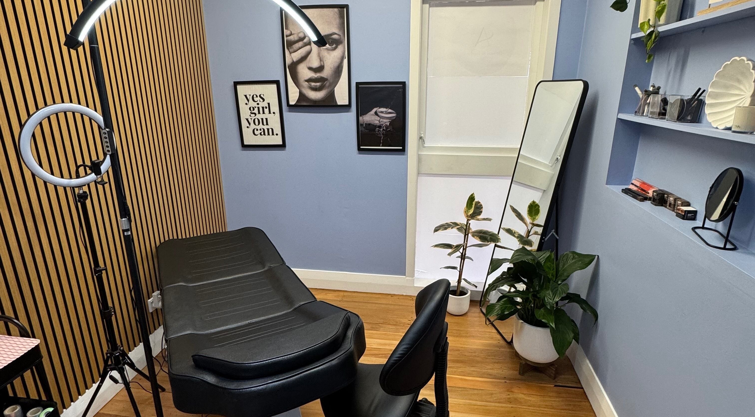 Elegant beauty treatment room with black chair at A.BrowsnLashes, Kerikeri, Northland, NZ.