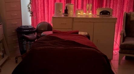 Relaxing massage room at Tranquility in Stratton, Western Australia, AU, featuring cozy ambiance and soft lighting.