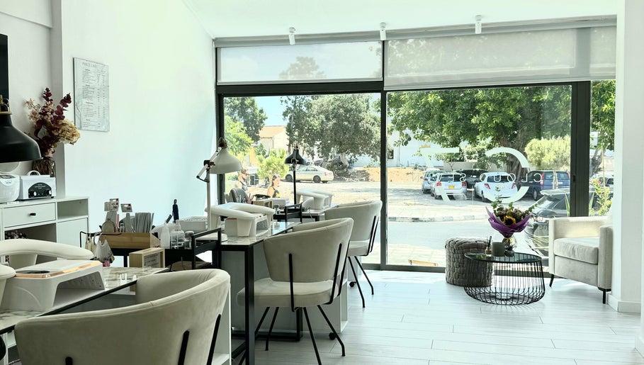 Cozy interior of Cloud7 Nails & Beauty in Paphos, CY, showcasing chic nail service stations.