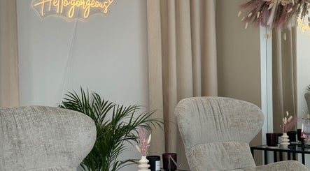 Chic lounge at Cloud7 Nails & Beauty, Paphos, with cozy chairs and decor.