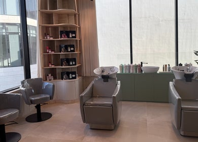 Luxury wash stations at Fayya Beauty Salon & Spa in Al Khobar, Eastern Province, SA with chic decor.