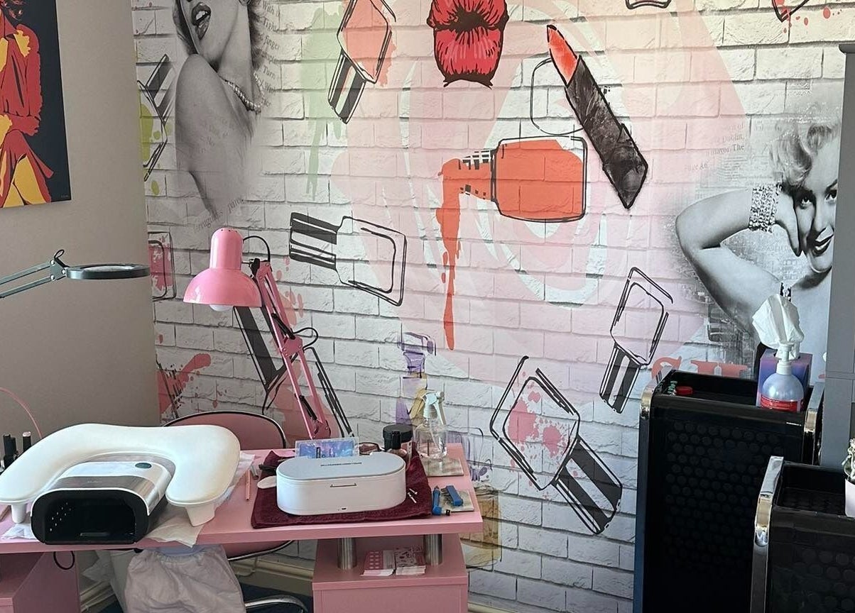 Stylish nail salon at Jazz Hands, Ripon, England, GB with vintage decor and vibrant wall art.