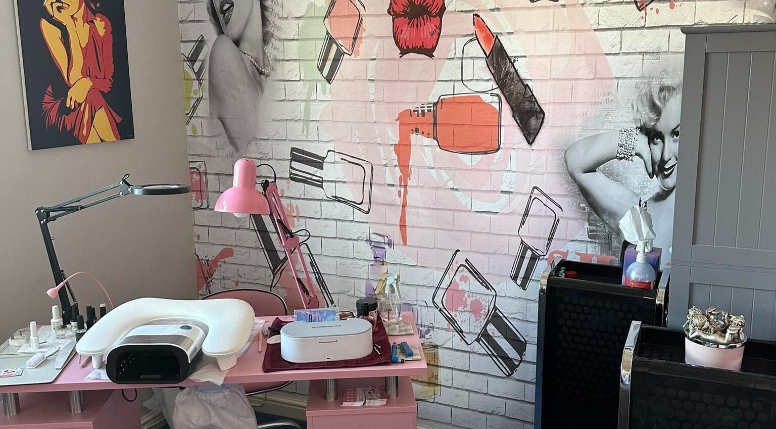 Elegant makeup station at Jazz Hands, Ripon, England, GB with artistic wall decor.