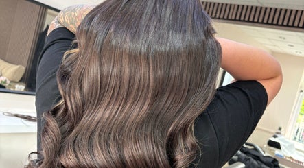 Shiny brown hair styled perfectly at Hair By Aimee, Birmingham, England, GB.