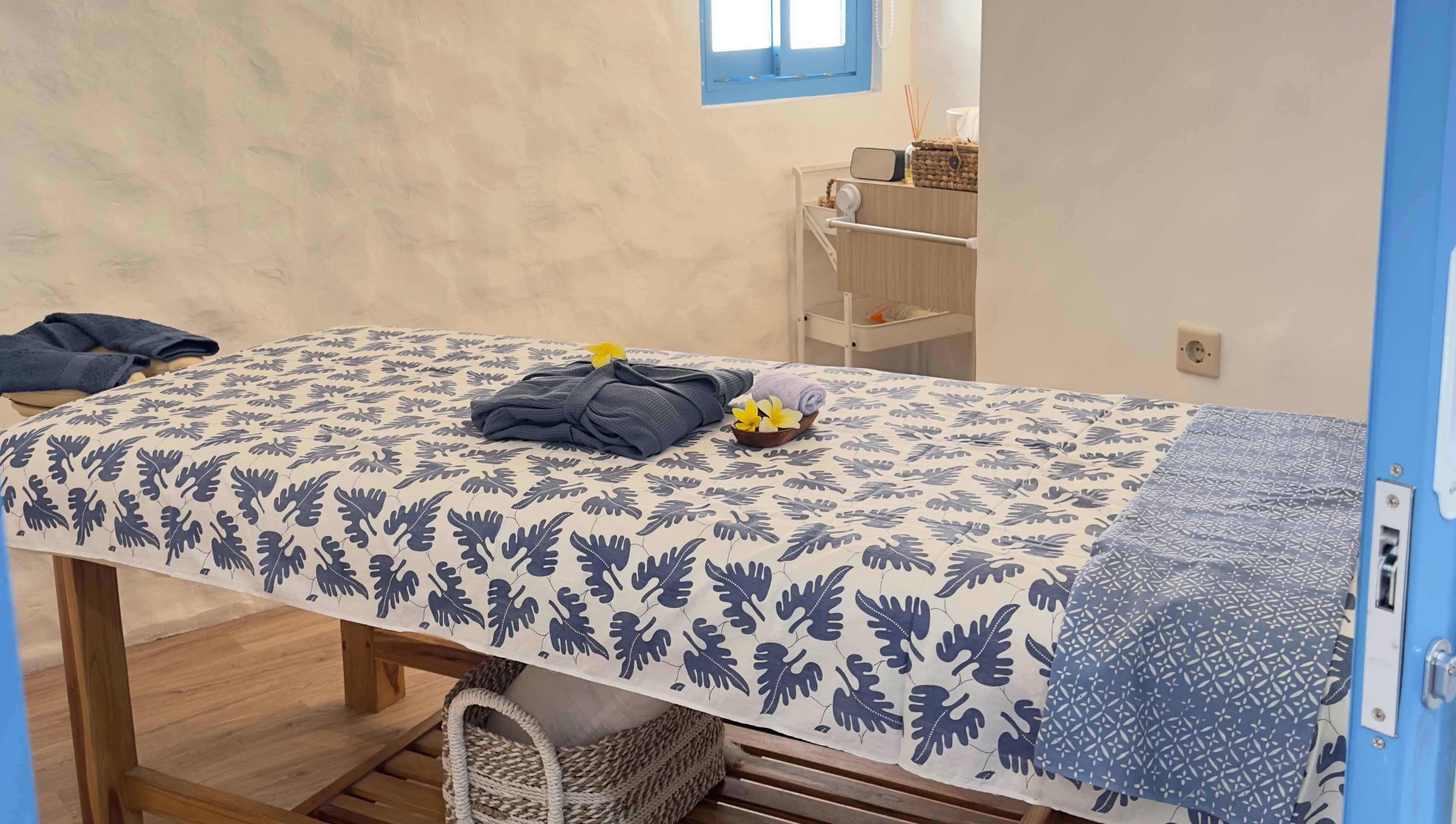 Tranquil massage room at Blue Cave Spa, Bali, Bali, ID with elegant decor and soft lighting.