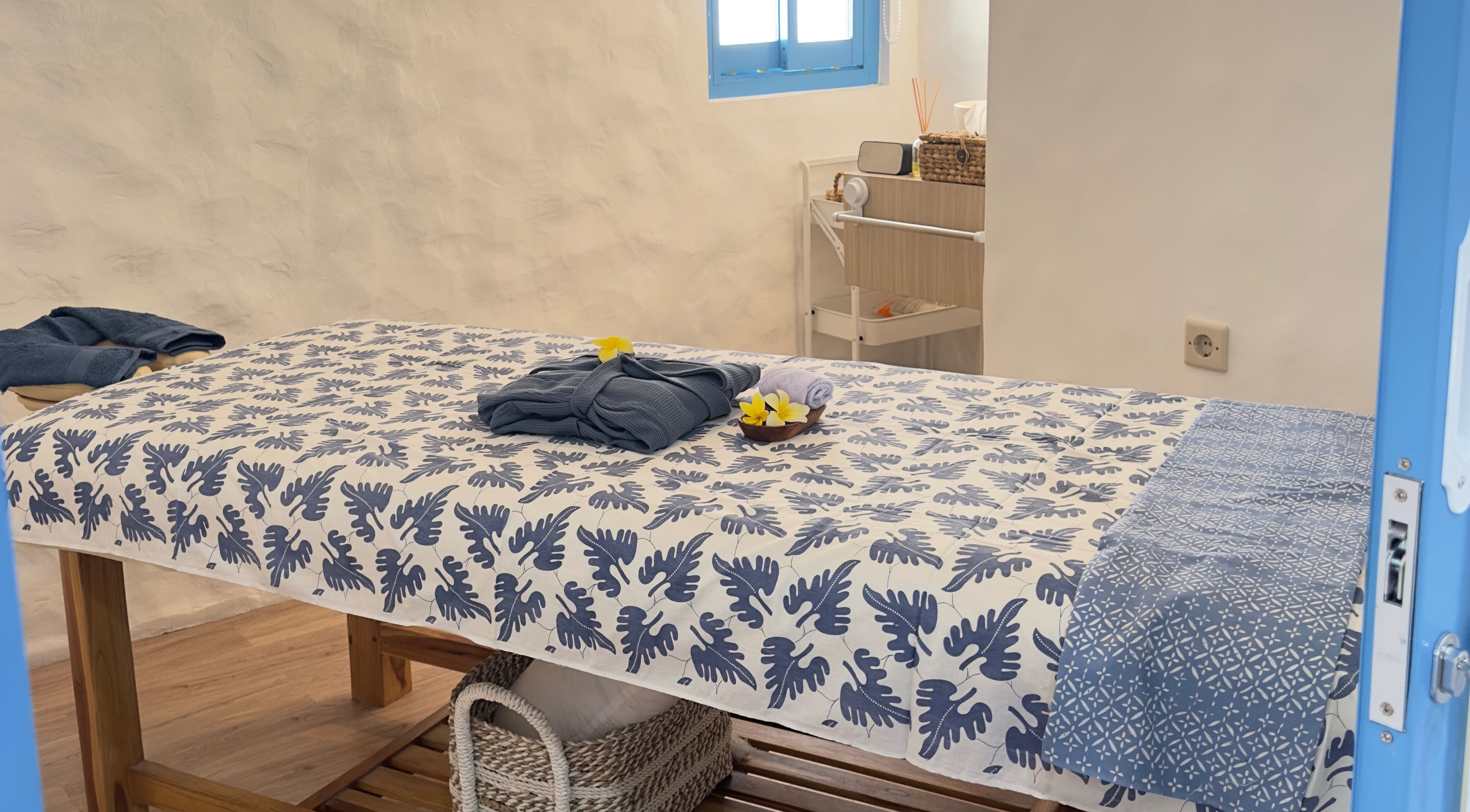 Tranquil massage room at Blue Cave Spa, Bali, Bali, ID with elegant decor and soft lighting.