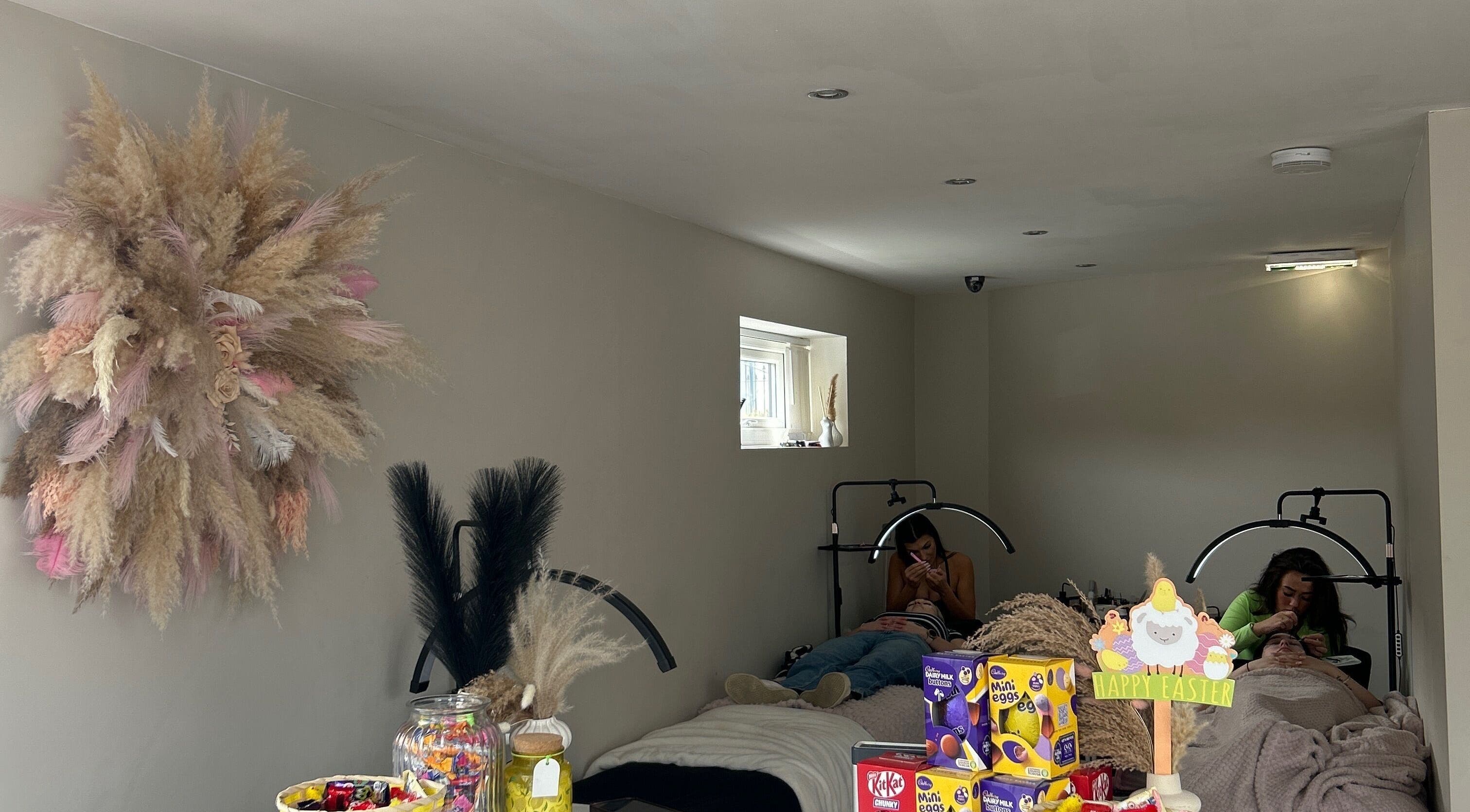 Relaxing beauty treatment at Dolled Up, Bournemouth, England, GB with cozy decor and soothing atmosphere.