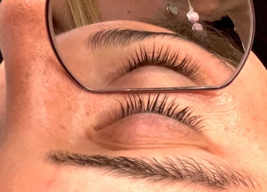 Close-up of eyelashes in a mirror at Dream Aesthetics, Chelmsford, England, GB.