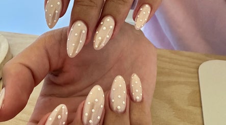 Stylish polka dot nails at Nails By Ness, Cove, Aberdeen, Scotland, GB. Perfect blend of elegance and creativity.
