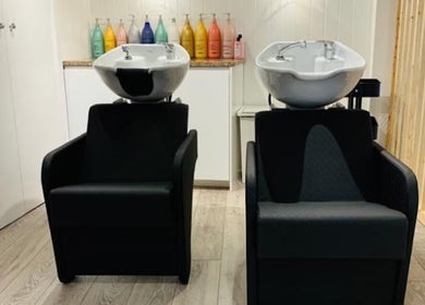 Modern shampoo stations at Hidden Beauty Exeter, Exeter, England, GB, offer luxury hair care services.