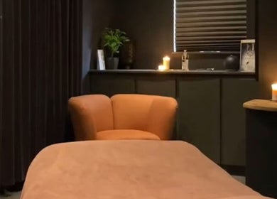 Cozy treatment room at Hidden Beauty Exeter, with warm lighting and soothing decor, at Exeter, England, GB.