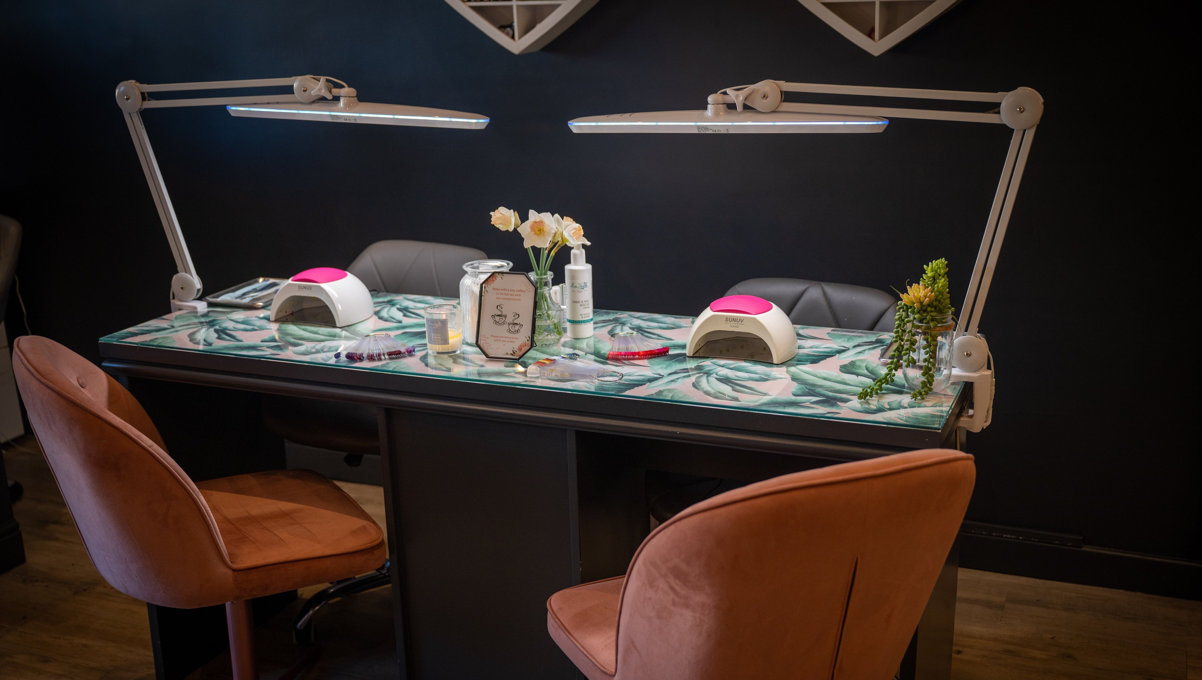 Chic nail station at Perfect You, Teddington, England, GB, featuring modern decor and bright lighting.