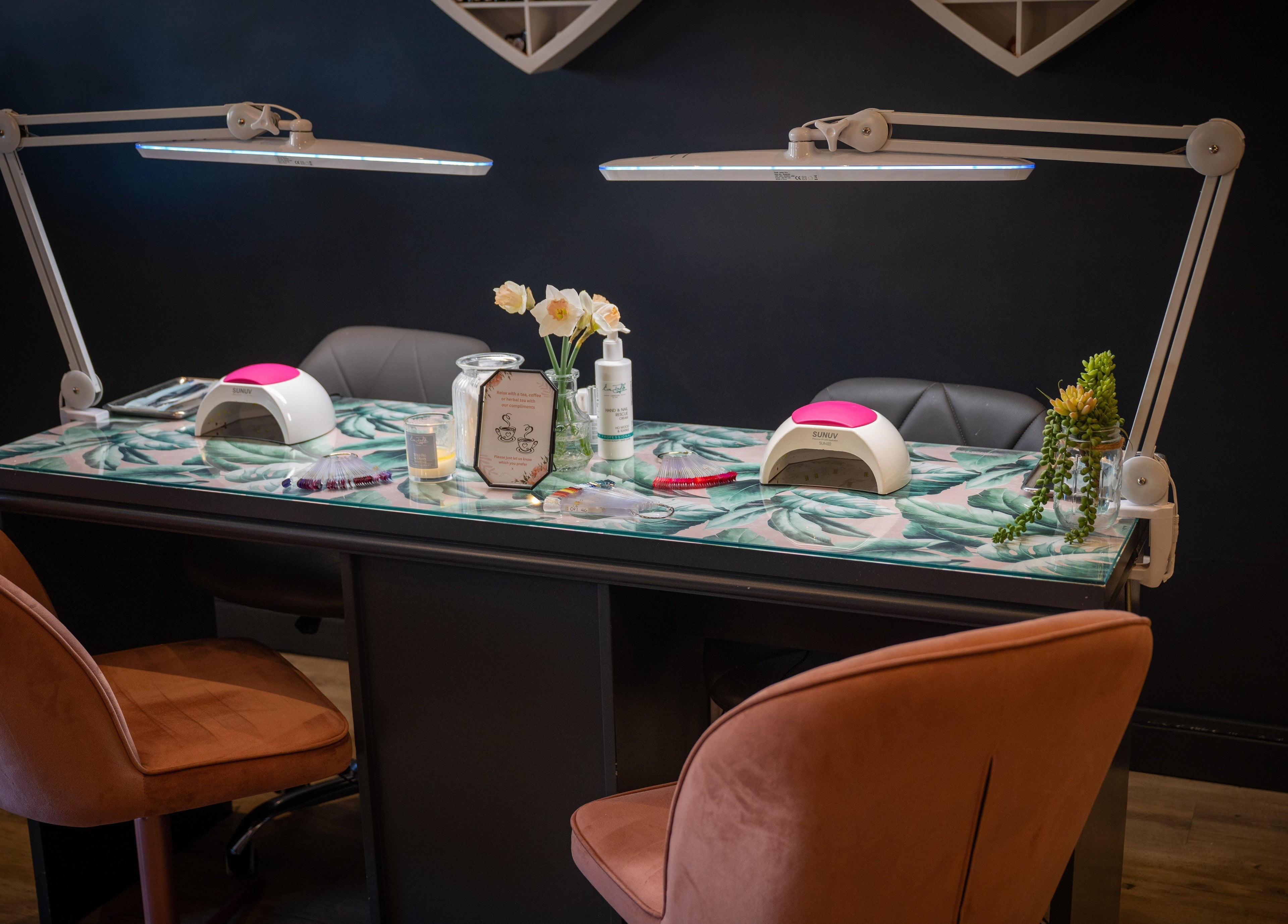 Chic nail station at Perfect You, Teddington, England, GB, featuring modern decor and bright lighting.