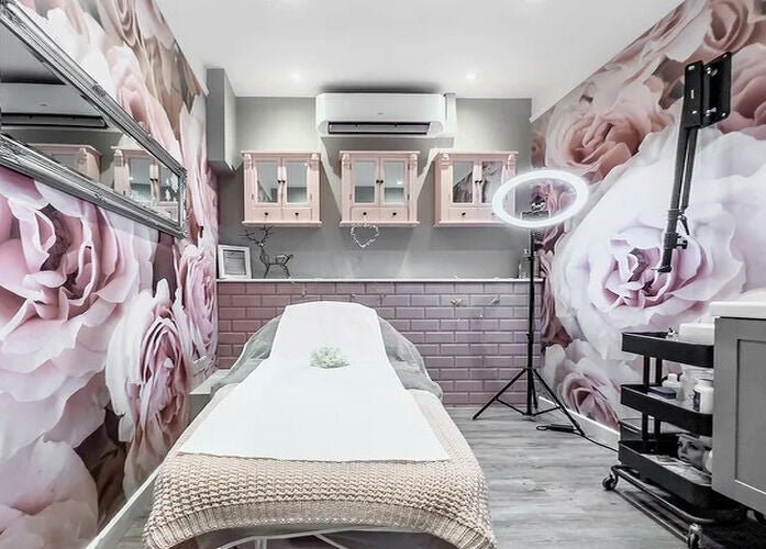 Tranquil treatment room with floral decor at Perfect You in Teddington, England, GB.
