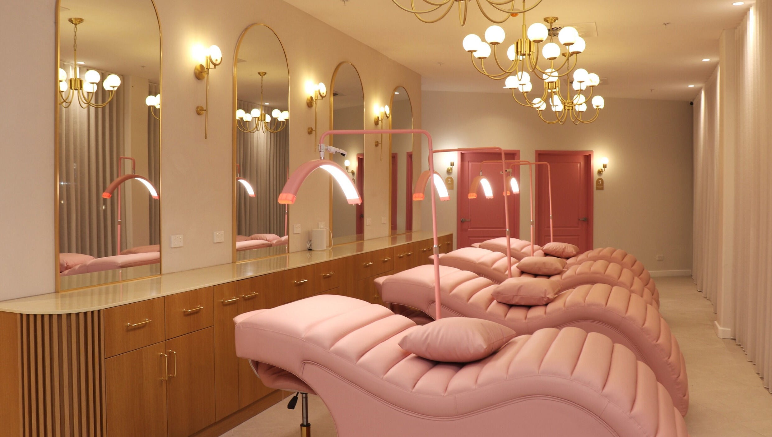 Elegant lounge with pink chairs at Posh Deluxe, Mount Pleasant, Western Australia, AU.