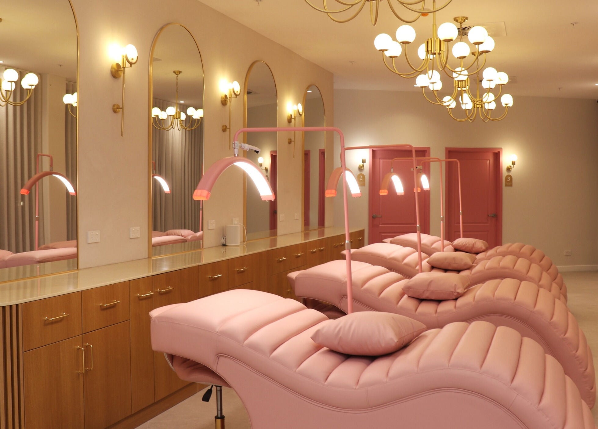 Elegant lounge with pink chairs at Posh Deluxe, Mount Pleasant, Western Australia, AU.