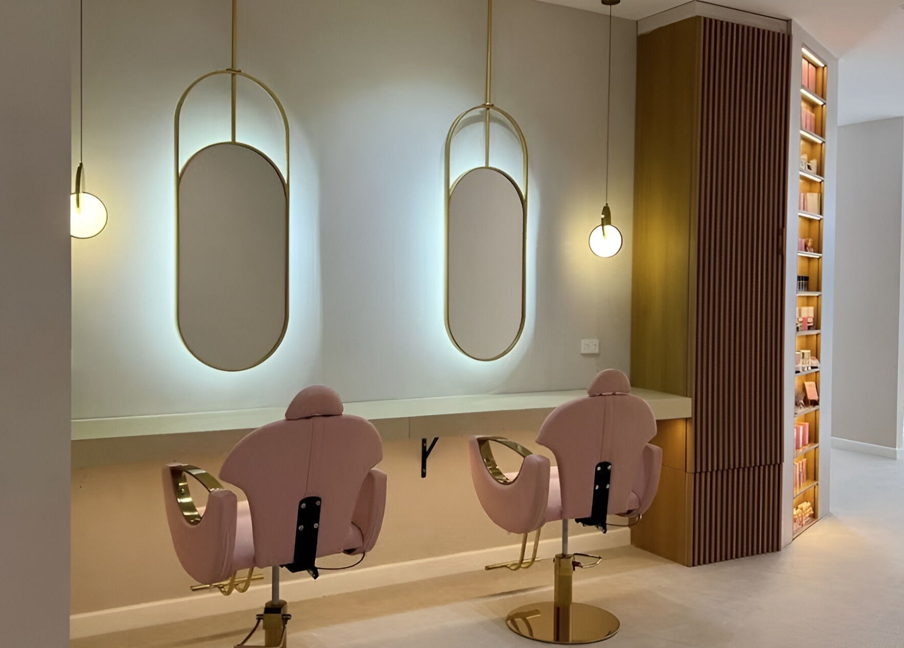 Chic styling area at Posh Deluxe, Mount Pleasant, Western Australia, AU with pink chairs and modern mirrors.
