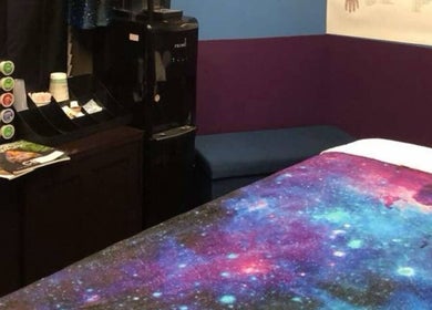 Cozy therapy room with galaxy theme at Truly Gifted Therapy in Washington, DC, US.