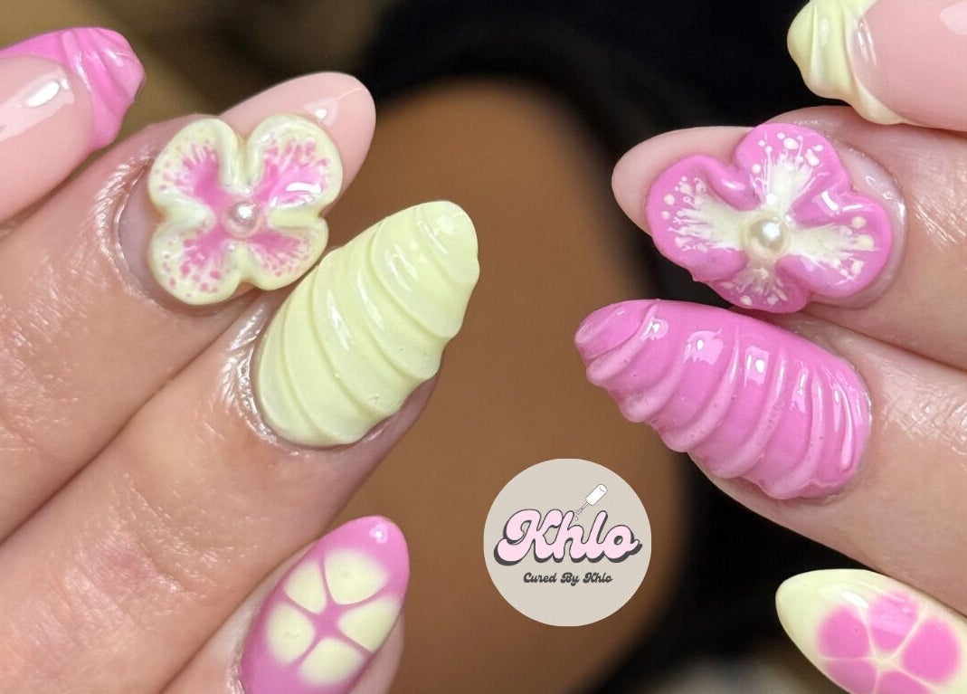 Intricate floral-themed nail art at CURED BY KHLO in Great Bookham, England, GB.