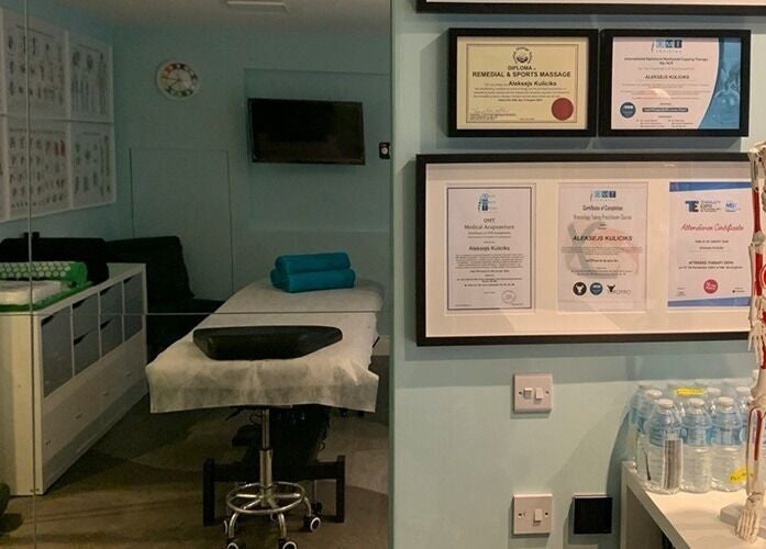 Therapy room at SPINEWELL - Remedial and Sports Massage Therapy in Dunfermline, DUNFERMLINE, GB, featuring massage table.