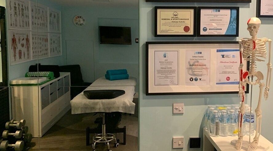 Therapy room at SPINEWELL - Remedial and Sports Massage Therapy in Dunfermline, DUNFERMLINE, GB, featuring massage table.